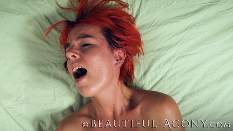 Beautiful agony orgasm face