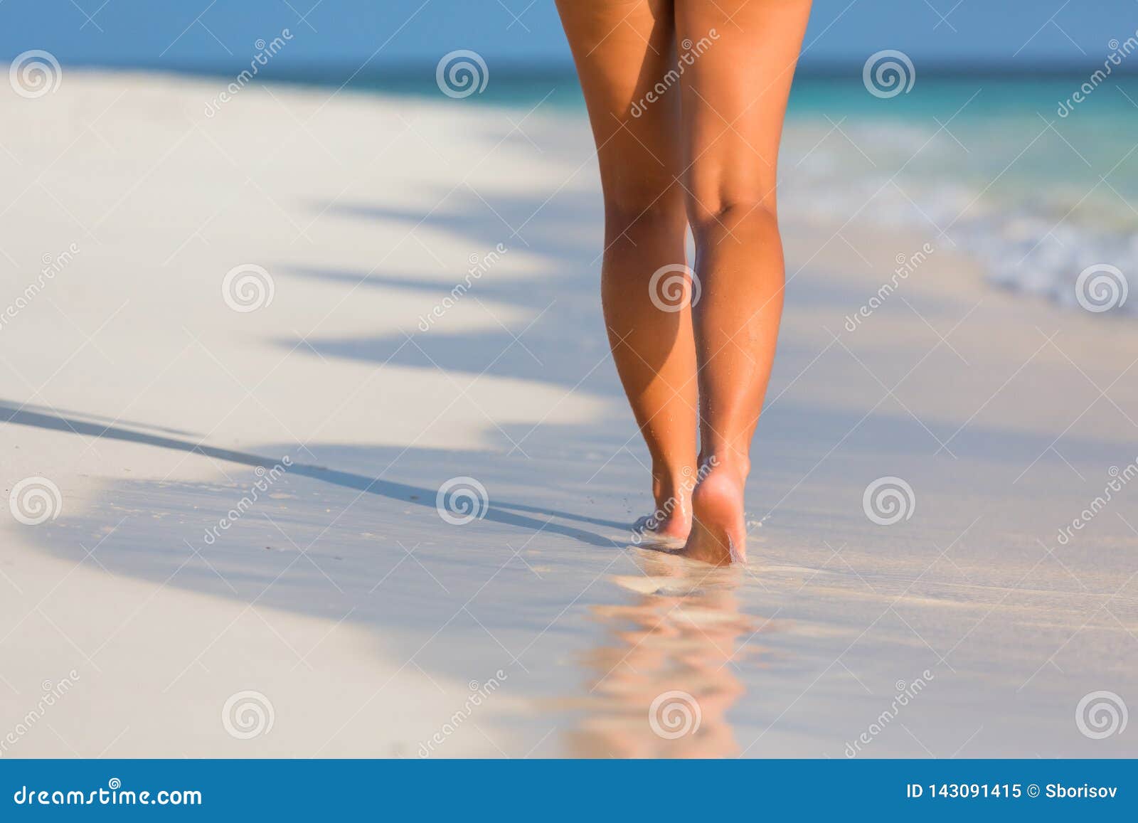 Naked teens walking on beach
