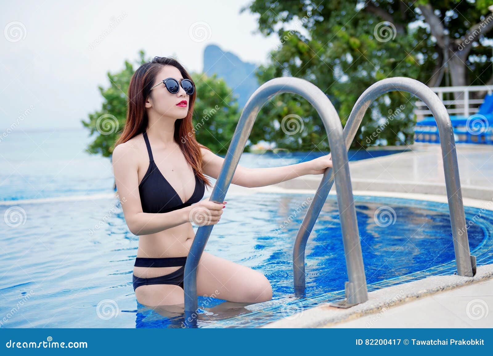 Wife bikini swimming pool