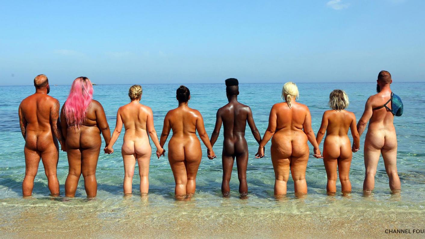 Naked at the beach family