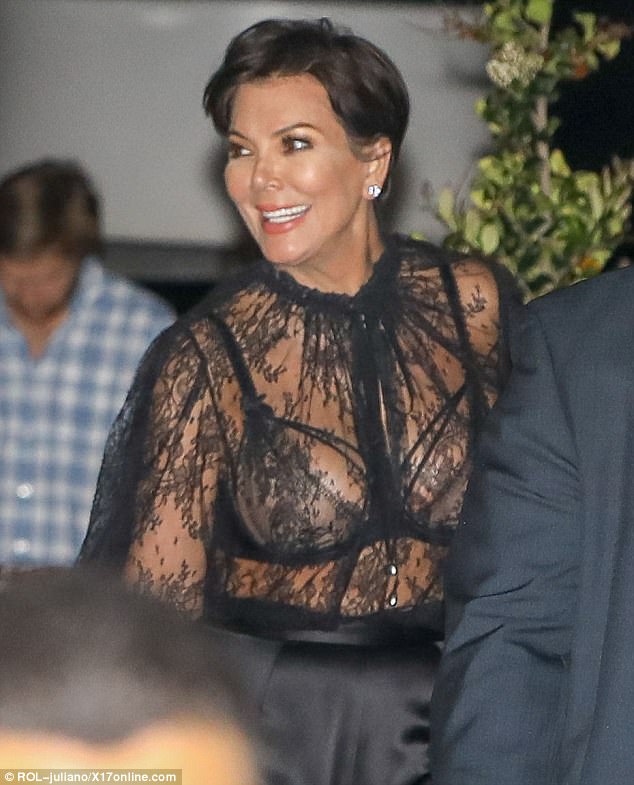 Mature woman in see through sheer blouse