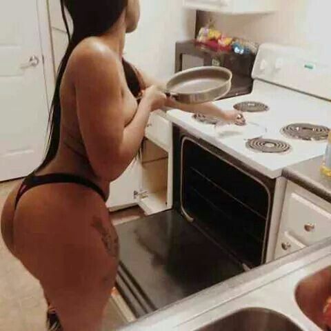 Naked women cooking breakfast