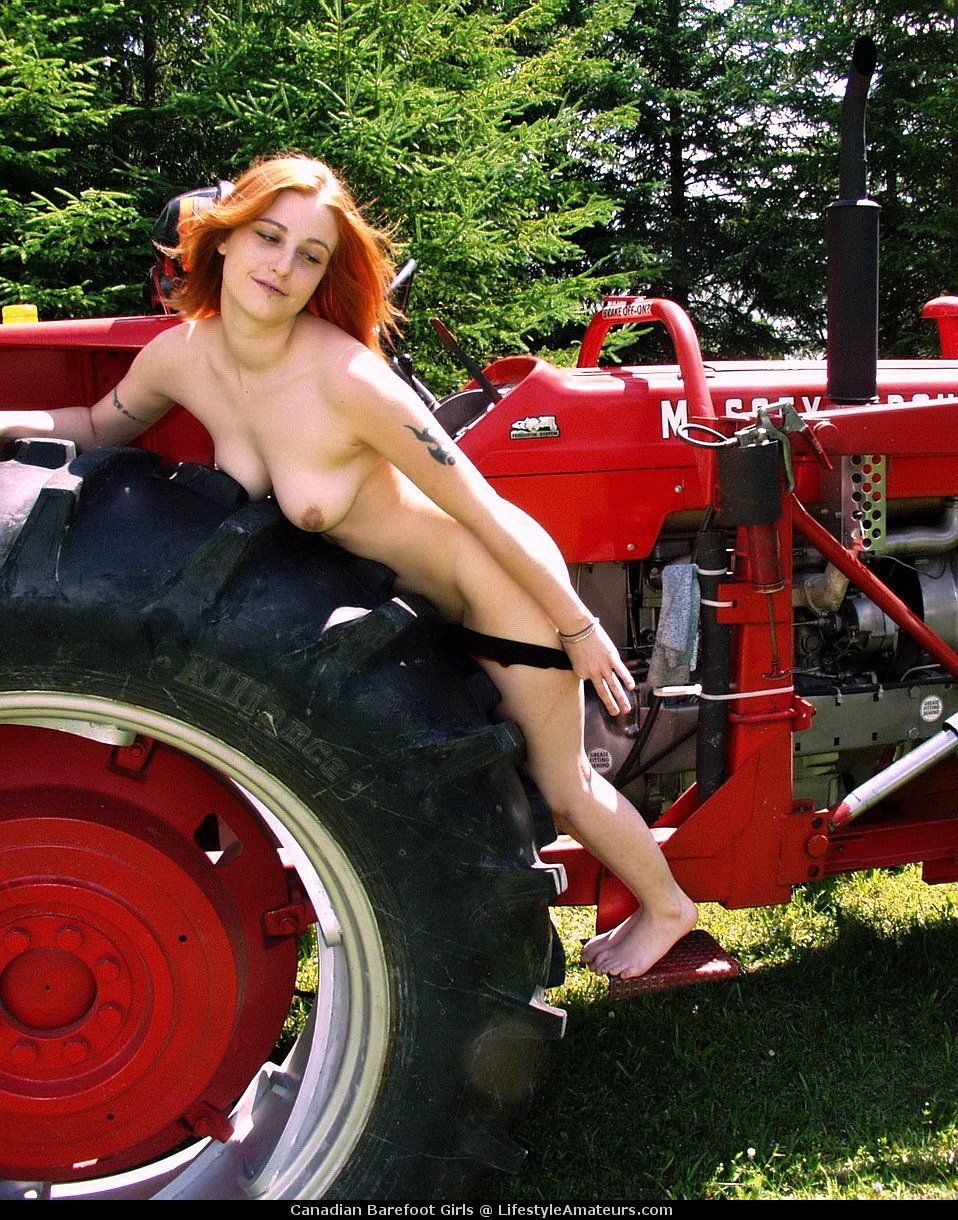 Nude farm girl naked on tractor