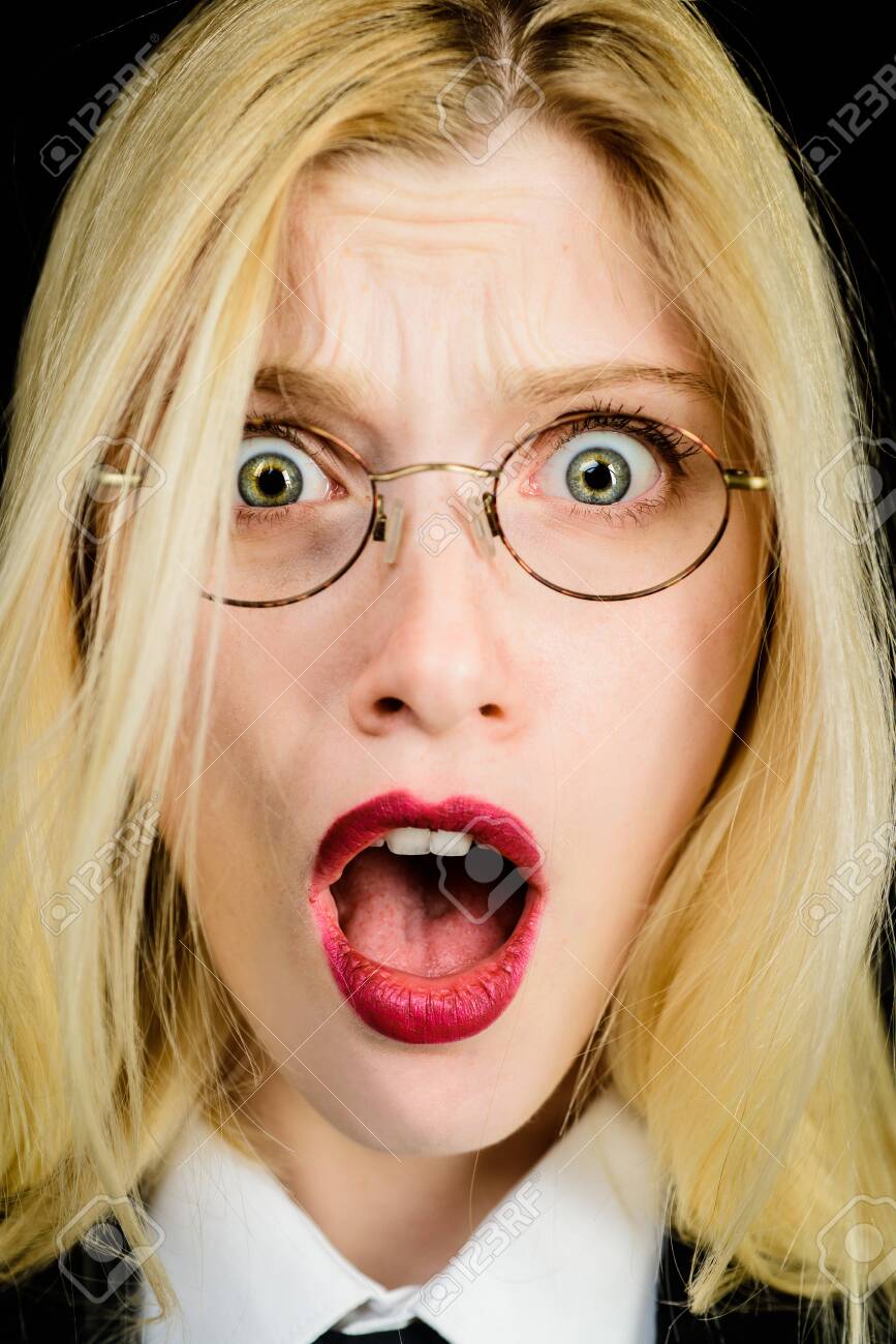 Blonde girl open mouth close up