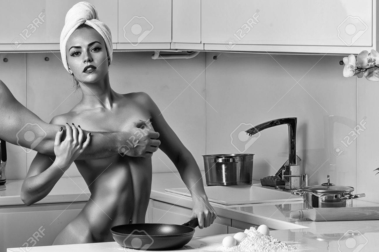 Naked women cooking breakfast