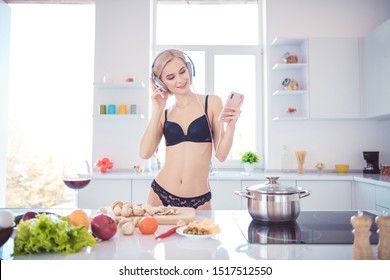 Sexy naked women cooking dinner