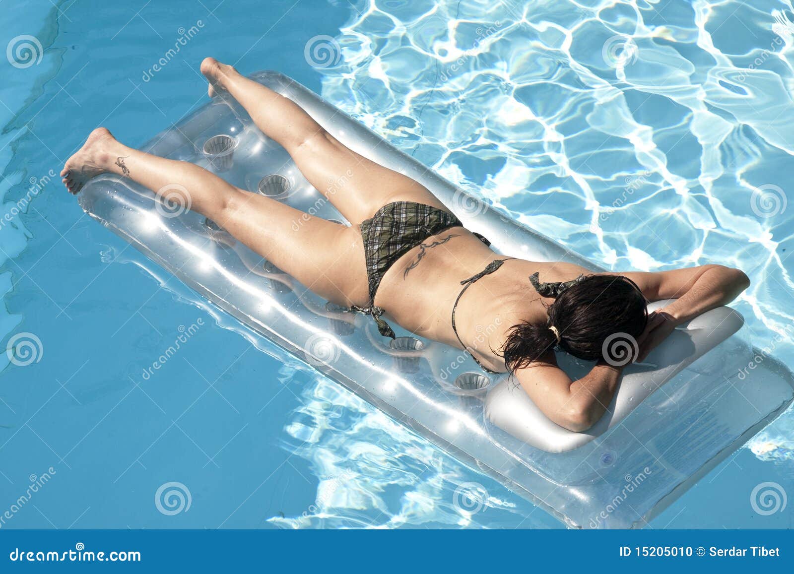 Nude girls sunbathing pool