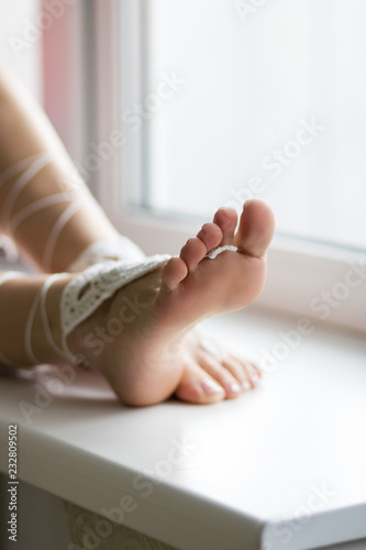 Feet up close soles girl