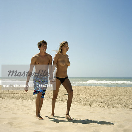 Nude couples on the beach